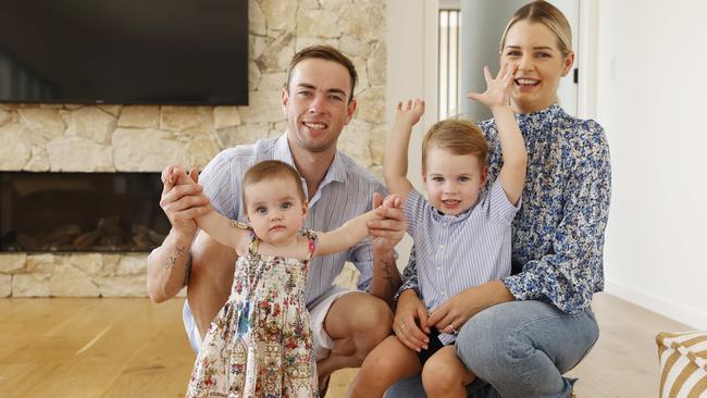 Jockey James Orman with wife Heidi and children Floyd and Hallie, relaxing at home in Nudgee. Picture: Lachie Millard