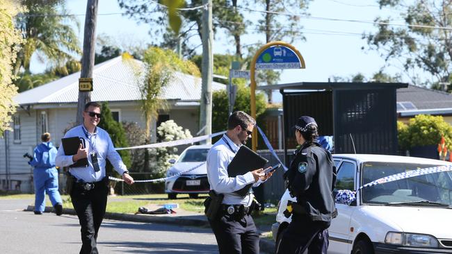 Police at the scene where a man and woman were shot in in Goman St, Sunnybank Hills, Brisbane on Saturday. Picture: AAP