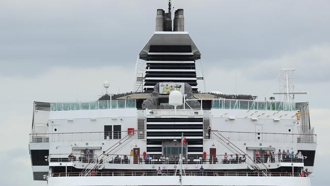 Passengers onboard the cruise ship Vasco da Gama look on from the decks as fellow passengers prepare to board a ferry to Rottnest Island on March. Picture: Paul Kane/Getty Images