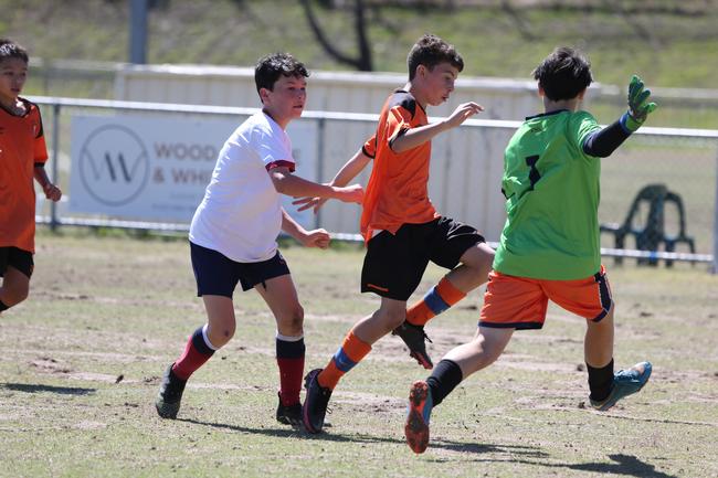 The Premier Invitational football tournament on the Gold Coast. TSS v Brisbane Roar under-13s in action. Picture: Mike Batterham.