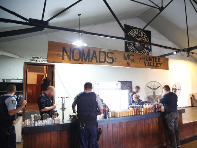 Alcohol, a bar, bikie colours and paraphernalia were seized during the police operation.