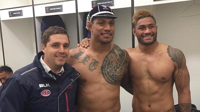 Rebels pair Lopeti Timani and Amanaki Mafi with Melbourne Rebels coach Dave Wessels. The pair had been reportedly close friends prior to their alleged bust-up. Source: Instagram