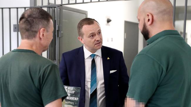 Pictured is Governor of Parklea Correctional Centre, Paul Baker speaking with inmates in the common area of the Gold Cell Wing, during a look inside Parklea Correctional Centre in Sydneys West today. Picture: Tim Hunter.