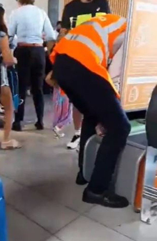 Even airport staff were unable to get the suitcase out. Picture: Reddit