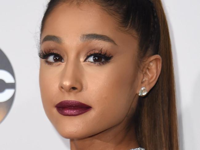 (FILES) This file photo taken on November 20, 2016, shows US singer Ariana Grande arriving for the 2016 American Music Awards in Los Angeles, California. British police said early May 23, 2017, that there were 