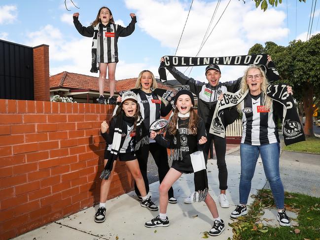 WEEKEND : AFL clubs and suburbs with members. Linda Monteneri with her son Matthew 19yrs and Lauren 25yrs and other supporters Lucinda 8yrs , Pia 10yrs and Milli 11yrs in the suburb of Reservoir.  Picture: Ian Currie