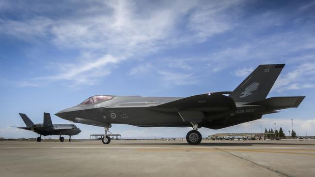 Royal Australian Air Force and United States Air Force F-35A aircraft taxi toward the runway prior to a training mission at Luke Air Force Base, Arizona, USA. *** Local Caption *** After Royal Australian Air Force F-35A pilots conduct independent operations at Luke Air Force Base with the aircraft they will bring home in December 2018.   Royal Australian Air Force pilots are also embedded within the United States Air Force 61st Fighter Squadron to train the next generation of Royal Australian Air Force and United States Air Force F-35A pilots. The Royal Australian Air Force also partners with Lockheed Martin as they prepare to introduce Australia’s first fifth-generation air combat capability.   The F-35A Joint Strike Fighter is the most advanced, affordable, fifth-generation multi-role stealth fighter to meet Australia’s need to defeat emerging threats well into the future. The F-35A is truly next-generation due to its stealth capability, advanced sensors, data fusion and its ability to share information with other aircraft, Army units and Navy ships. The Australian Government has approved the purchase of 72 F-35A aircraft to replace F/A-18A/B Hornets.