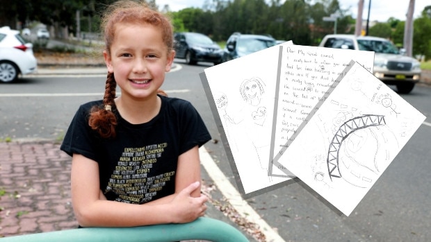 Mackaela Komene, 11, crosses Stanhope Parkway to get to her school. Picture: Angelo Velardo