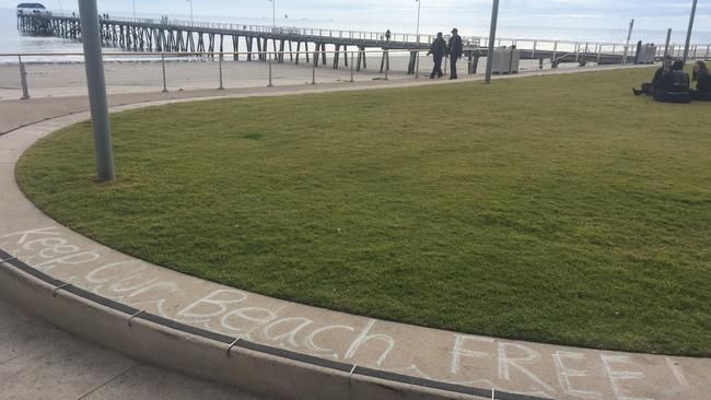 Anti-paid parking chalk art at Henley Beach.