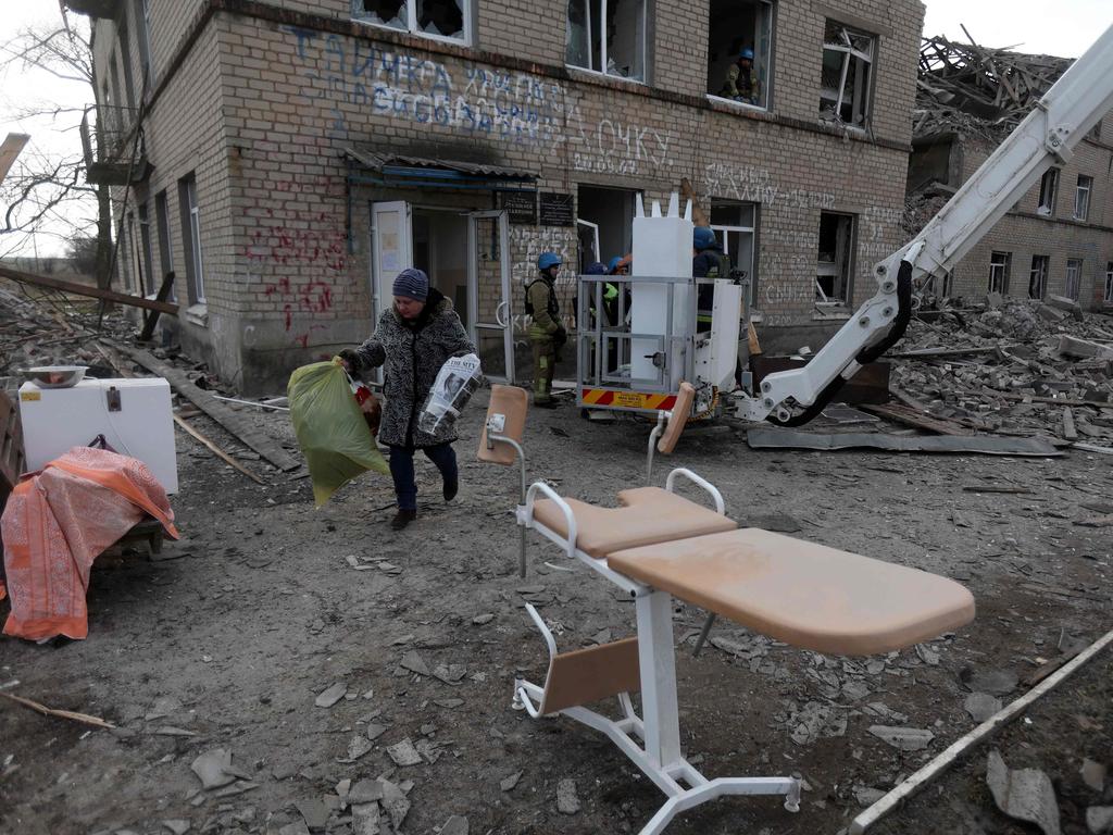 State Emergency Service of Ukraine and medical staff evacuate a maternity hospital destroyed by a Russian missile attack in the town of Selydove, Donetsk region. Picture: AFP
