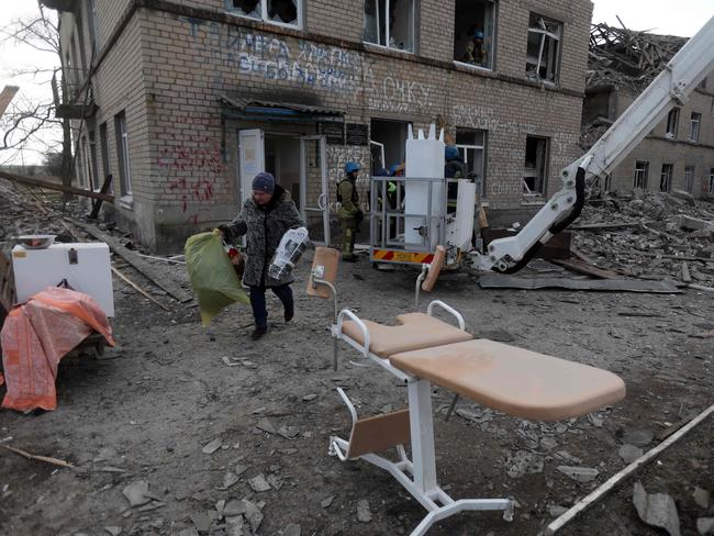 State Emergency Service of Ukraine and medical staff evacuate a maternity hospital destroyed by a Russian missile attack in the town of Selydove, Donetsk region. Picture: AFP