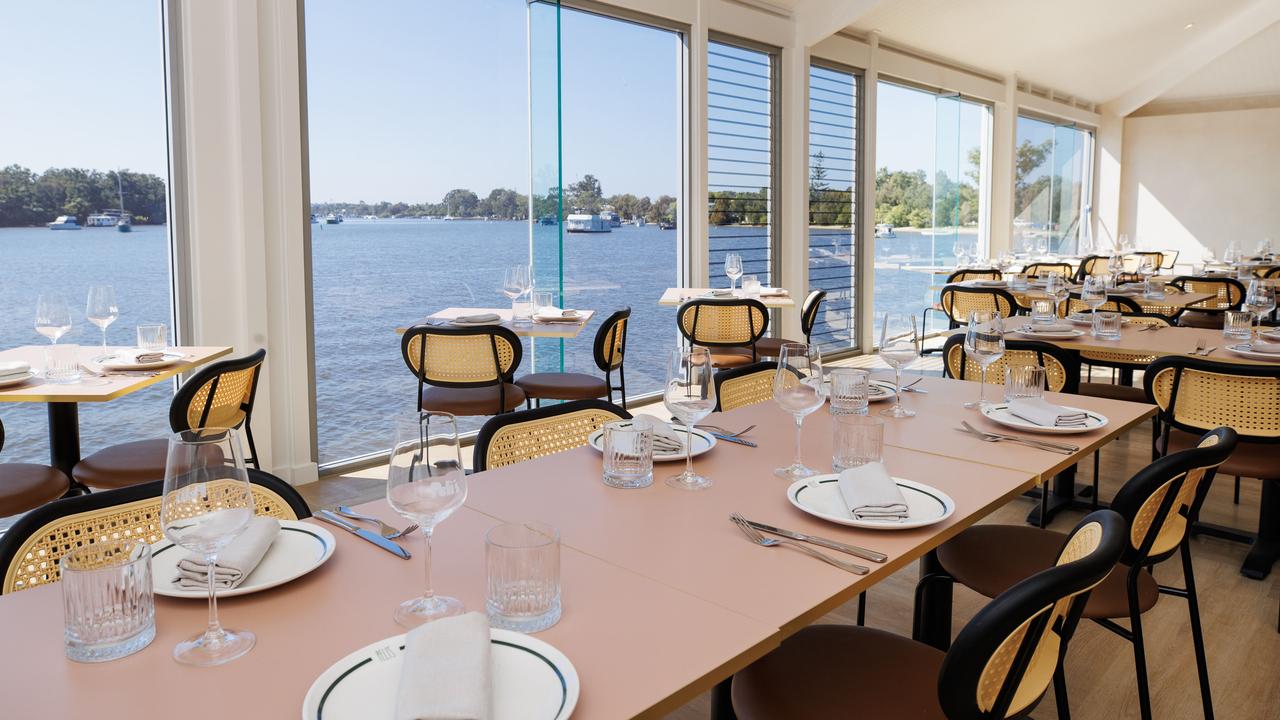 The main dining room offers uninterrupted waterfront views. Picture: Lachie Millard