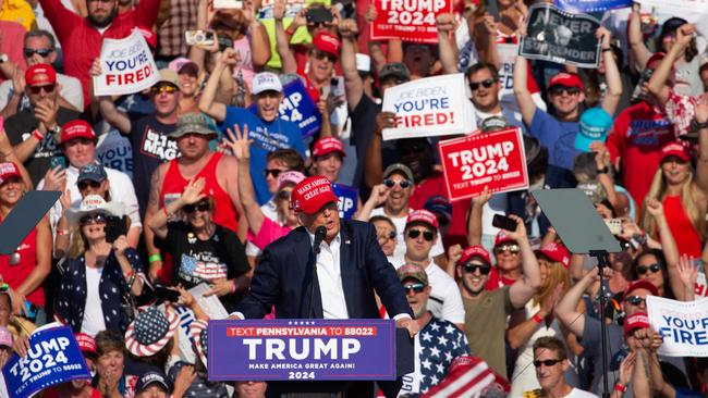 Former US President and Republican presidential candidate Donald Trump speaks during a campaign event at Butler Farm.