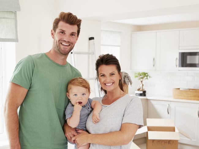 A young couple have just moved into the first home and have signed up to a new mortgage. Picture: iStock.