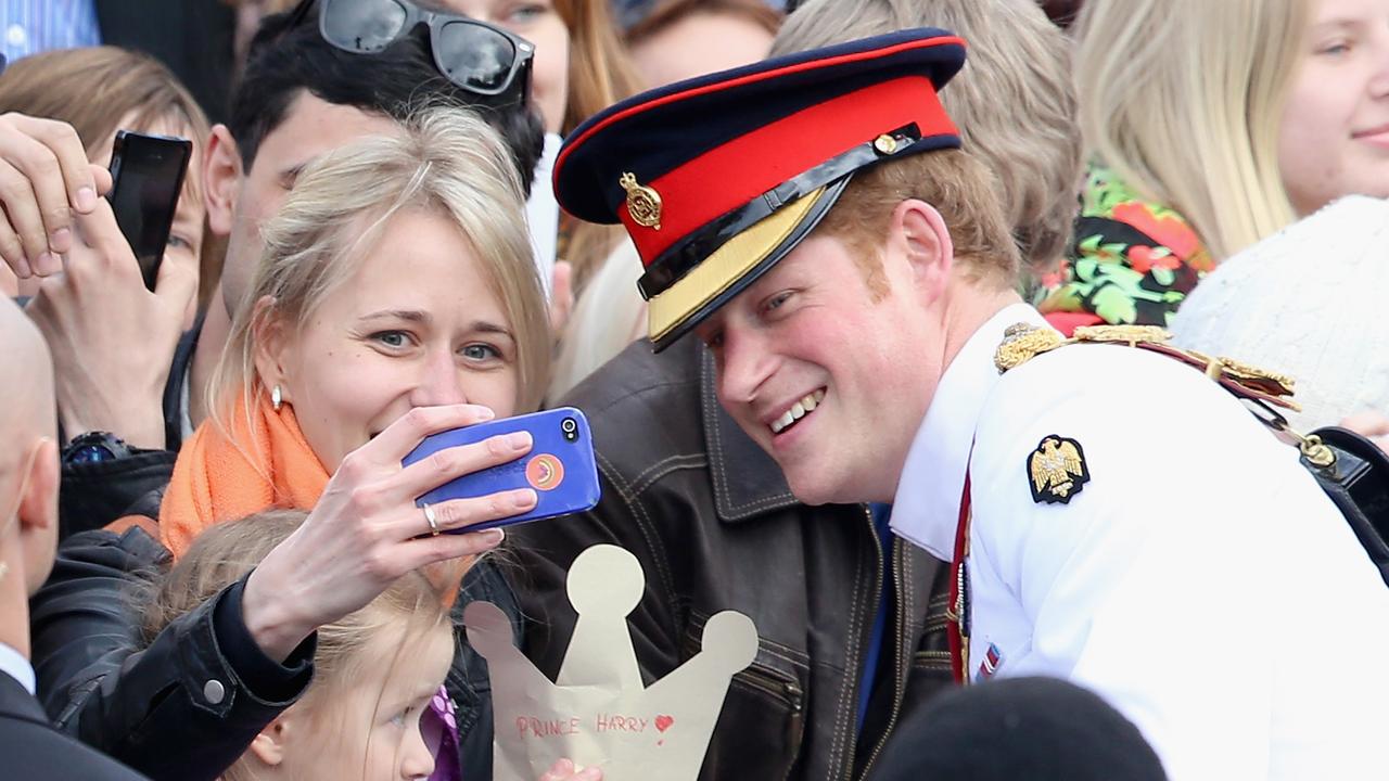 Harry has popped up in a few selfies over the years. Picture: Getty Images.