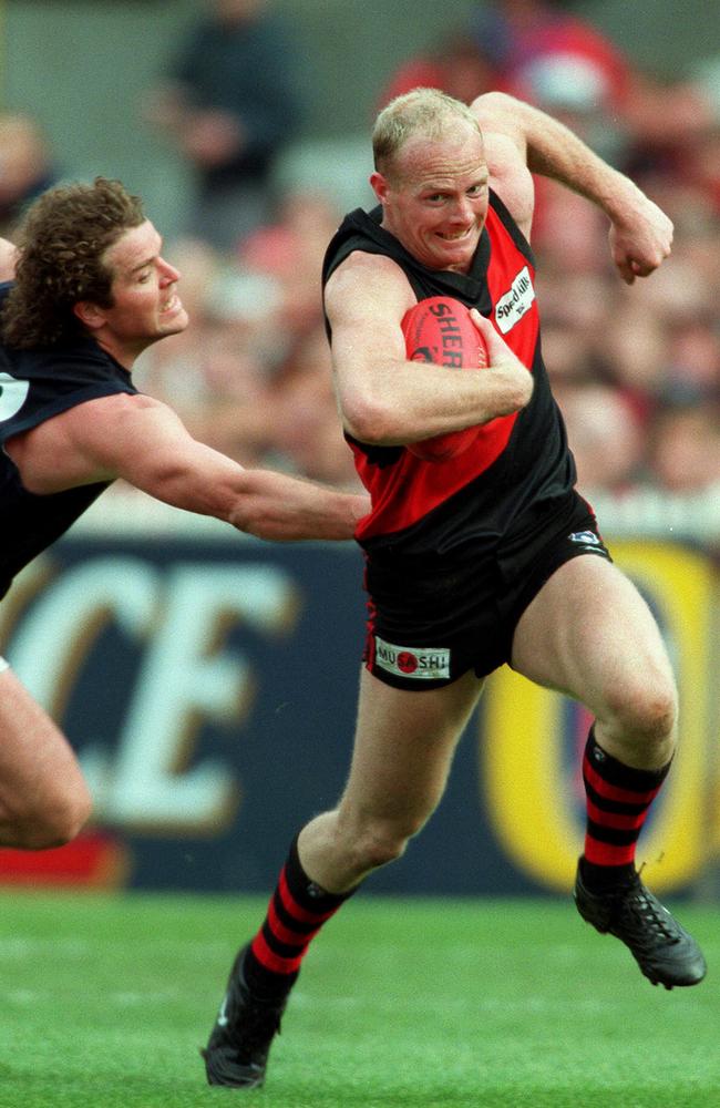 Fraser Brown runs down Dean Wallis to save the 1999 preliminary final for Carlton.