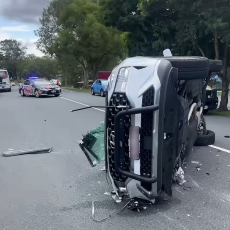 A man is in hospital after being trapped in a multi-vehicle crash south of Brisbane.