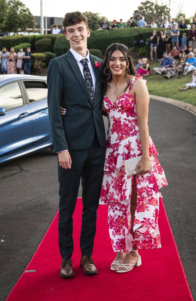 Graduate Noah Gunders and partner Ebony Naiker arrive at Mary MacKillop Catholic College formal at Highfields Cultural Centre, Thursday, November 14, 2024. Picture: Kevin Farmer