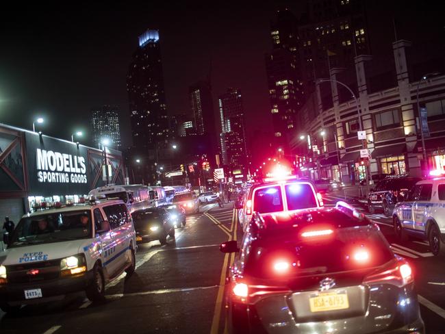 Police vehicles line the main roads after dispersing protesters near the Barclays Center in New York. Floyd. Picture: AP