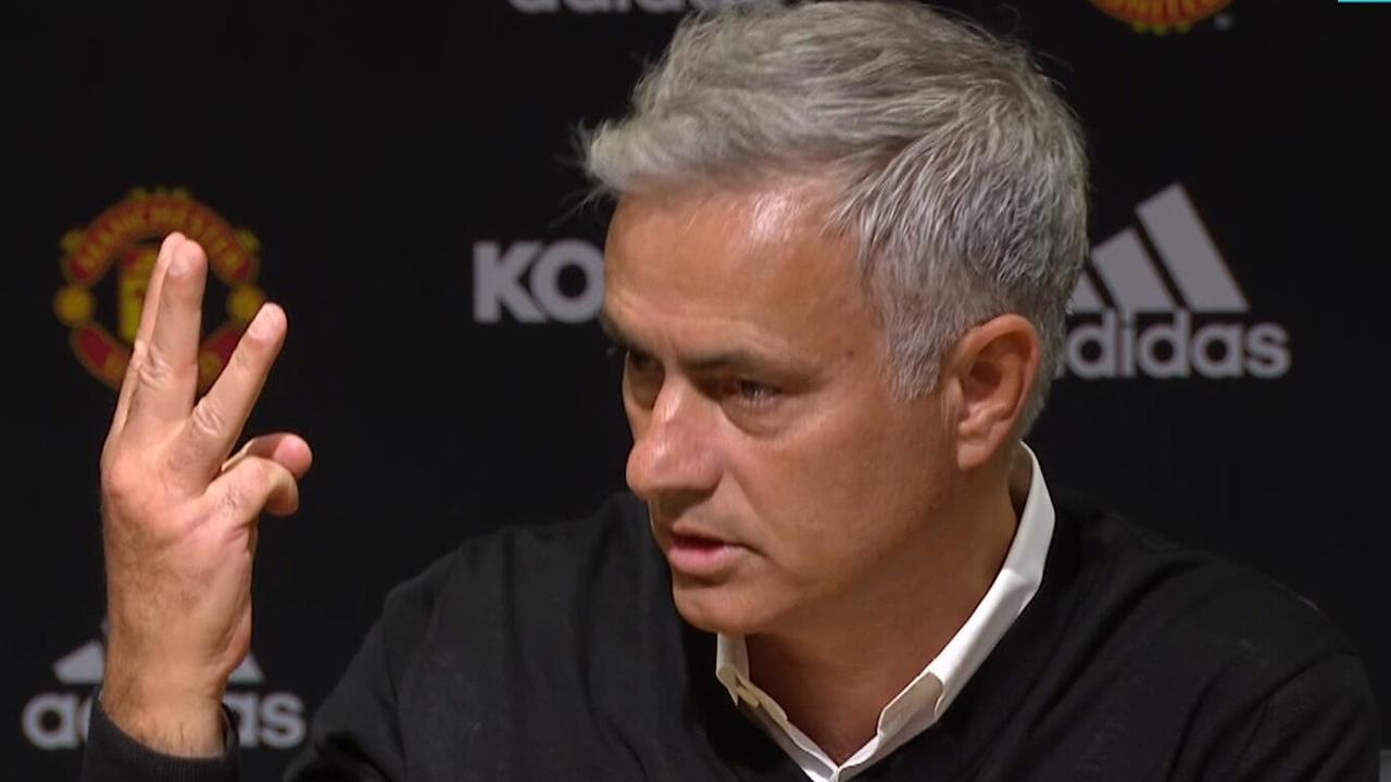 Jose Mourino holds up three fingers to represent the 3-0 loss... and the number of Premier Leagues he's won