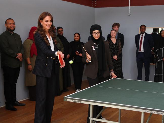 The famously sporty royal has a go at table tennis. Picture: AFP