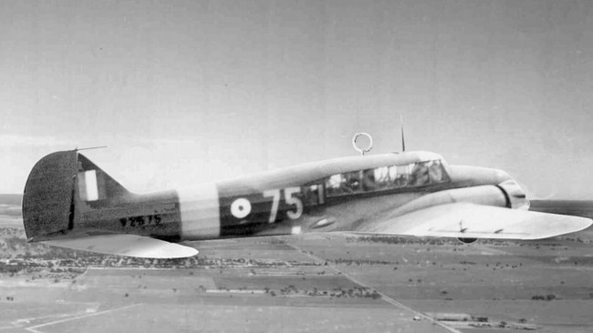 An Avro Anson flies over the training facility at Nhill in WWII.