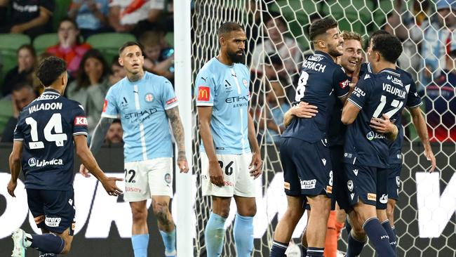 MELBOURNE, AUSTRALIA - OCTOBER 26: mv6is congratulated by team mates after scoring a goal during the round two A-League Men match between Melbourne City and Melbourne Victory at AAMI Park, on October 26, 2024, in Melbourne, Australia. (Photo by Quinn Rooney/Getty Images)