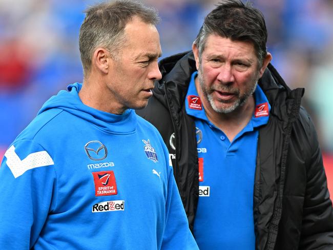 HOBART, AUSTRALIA - AUGUST 06: Alastair Clarkson, Senior Coach of the Kangaroos and Brett Ratten, Assistant Coach of the Kangaroos are seen during the round 21 AFL match between North Melbourne Kangaroos and Melbourne Demons at Blundstone Arena, on August 06, 2023, in Hobart, Australia. (Photo by Steve Bell/Getty Images)