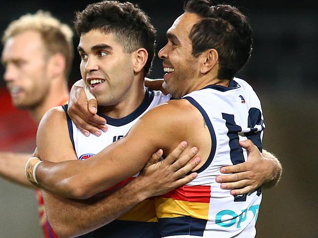 Tyson Stengle of the Crows celebrates his goal with Eddie Betts.