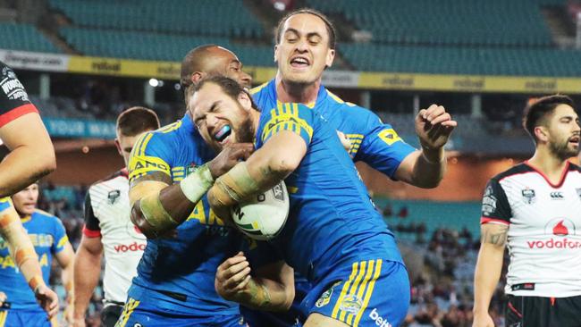 Tepai Moeroa celebrates a try for the Eels against the Warriors. Picture: Mark Evans