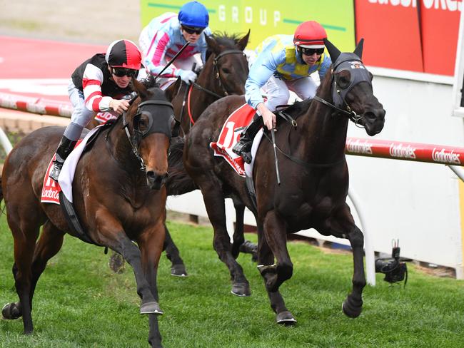 After stalking Heatherly into the home straight, jockey Ben Melham sets alight the Robbie Laing-trained Missrock (left) to quickly overrun the hot favourite. Picture: Getty Images