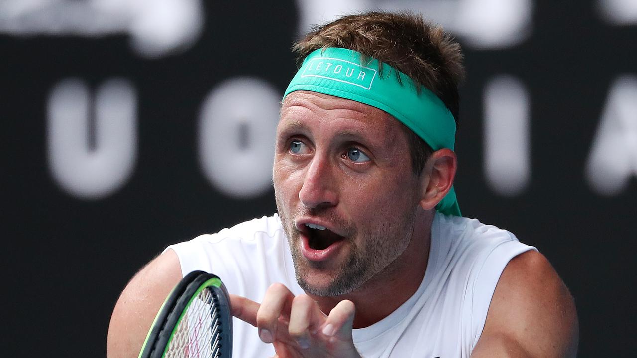 Tennys Sandgren in action against Roger Federer.