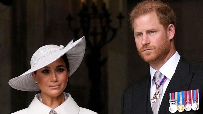 (FILES) Britain's Prince Harry, Duke of Sussex, and Britain's Meghan, Duchess of Sussex, leave at the end of the National Service of Thanksgiving for The Queen's reign at Saint Paul's Cathedral in London on June 3, 2022 as part of Queen Elizabeth II's platinum jubilee celebrations. Prince Harry and wife Meghan Markle were involved in a "near catastrophic car chase" involving paparazzi in New York late on May 16, 2023, a spokesperson for the couple said May 17. "This relentless pursuit, lasting over two hours, resulted in multiple near collisions involving other drivers on the road, pedestrians and two NYPD officers," the spokesperson added. (Photo by Matt Dunham / POOL / AFP)