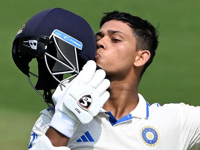 India's Yashasvi Jaiswal celebrates after scoring a century (100 runs) during the first day of the second Test cricket match between India and England at the Y.S. Rajasekhara Reddy cricket stadium in Visakhapatnam on February 2, 2024. (Photo by DIBYANGSHU SARKAR / AFP) / -- IMAGE RESTRICTED TO EDITORIAL USE - STRICTLY NO COMMERCIAL USE --