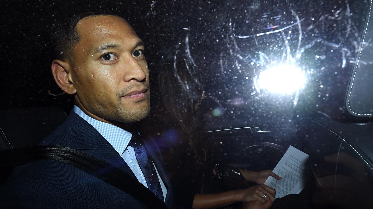 Wallabies star Israel Folau leaves a Code of Conduct hearing in Sydney.