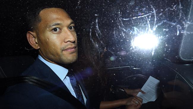 Wallabies star Israel Folau leaves a Code of Conduct hearing in Sydney.