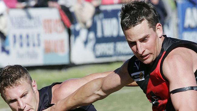 Frankston Bomber Travis Reints (right) is on the verge of the 300-game milestone.