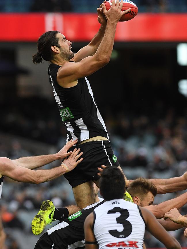 Brodie Grundy flies for a mark against the Power in Round 14. Picture: AAP