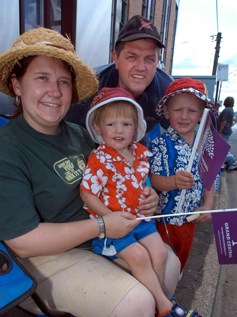 Duaine and Kelly Moore with their sons Lachlan 2yr and Jack 5yr enjoying the colour of the 58th Toowoomba Carnival of Flowers Street Parade as it makes its way through the City. Picture: David Martinelli.