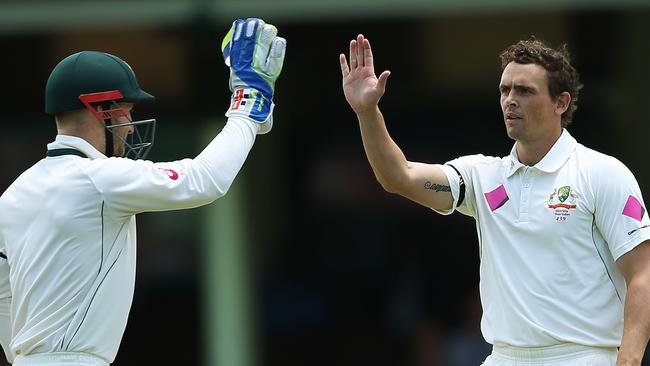 Australia's Stephen O'Keefe celebrates his wicket of Denesh Ramdin with Peter Nevill during Day 5 of 3rd cricket Test match between Australia and the West Indies at the SCG. Picture. Phil Hillyard