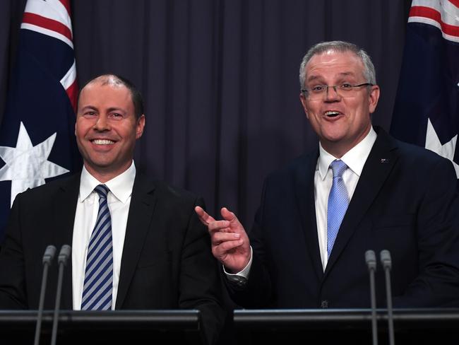 Mr Frydenberg and Mr Morrison address the country through a press conference this afternoon. Picture: AAP