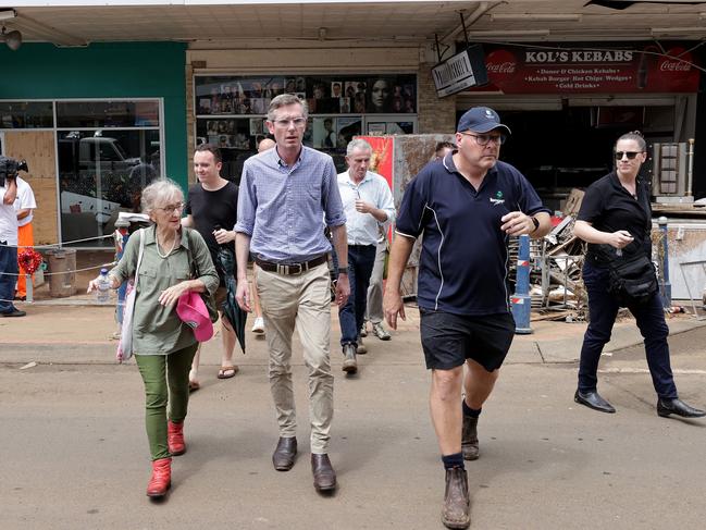 Premier Dominic Perrottet (centre) tours the Lismore CBD with local MP Janelle Saffin (left) and mayor Steve Kreig (right). Picture: Toby Zerna