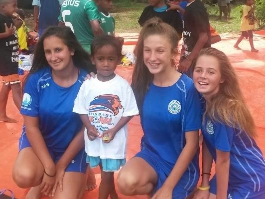 Leah Davidson (right centre) poses for a photo alongside her Palm Beach teammates in Fiji. Picture: Supplied.