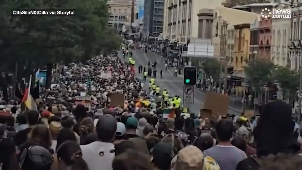 Massive crowds march through Sydney CBD For 'Invasion Day' protests