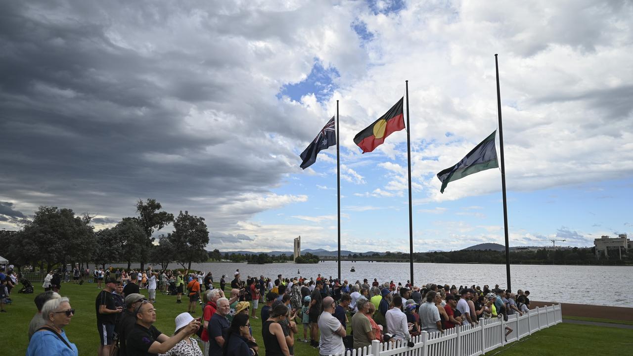 It’s just the second time the Indigenous and Torres Strait Islander flags have been raised at the ceremony. Picture: NCA NewsWire / Martin Ollman