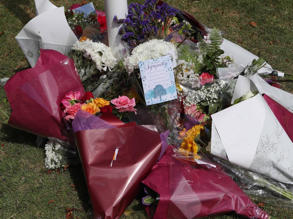 Flowers and cards left at Chinchilla Police Station. Picture: Liam Kidston