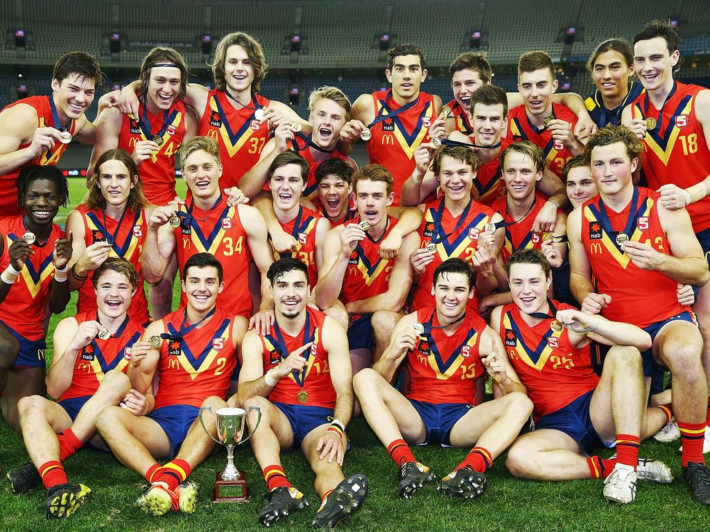 MELBOURNE, AUSTRALIA - JULY 04:  South Australia players celebrate the win during the U18 AFL Championship match between Vic Metro and South Australia at Etihad Stadium on July 4, 2018 in Melbourne, Australia.  (Photo by Michael Dodge/Getty Images)