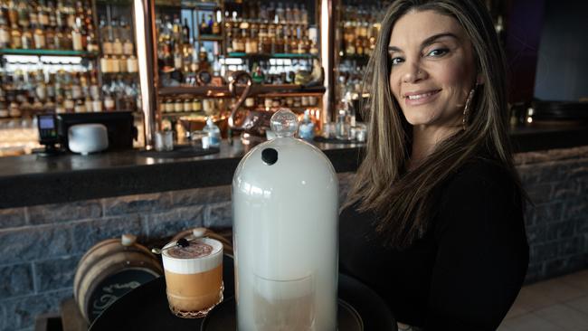 Heritage Lounge bar manager Lillian Shalala at the bar in the same building as Oribu restaurant. Picture: Brendan Read