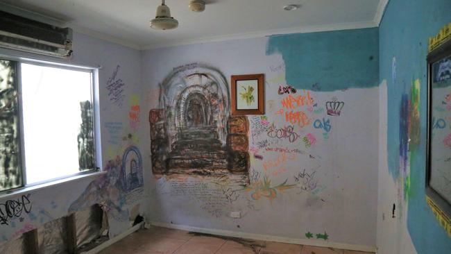 Artwork by former tenants will be painted over before new occupants move in. Picture: Peter Carruthers