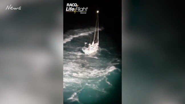 Two men and cat rescued from boat